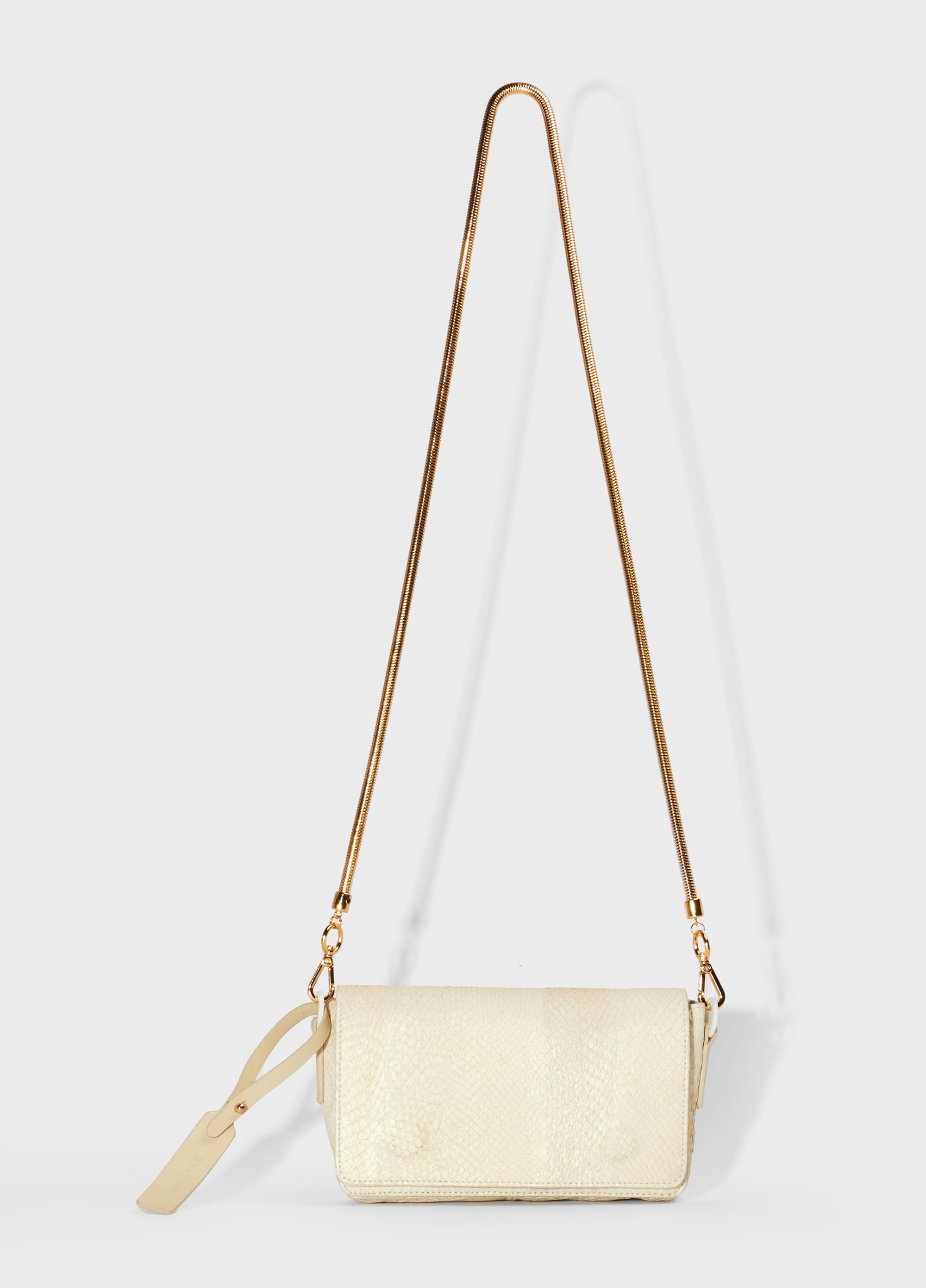 BOLSA NAITE GOLD